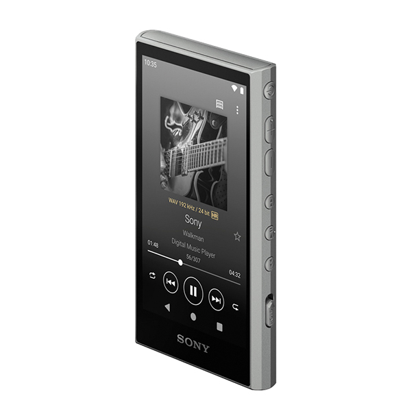 The silver Sony NW-A306 is a compact and sleek music player with a lightweight construction featuring a 3.1-inch touchscreen display. It has a physical volume rocker and playback buttons on the side of the device. 